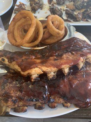 Full rack of ribs with a side of onion rings