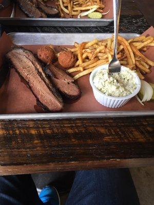 Brisket plate with White Coleslaw and French fries.