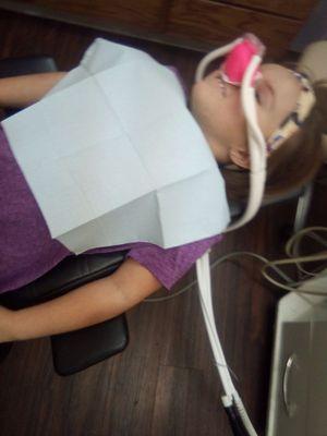 My Grandaughter getting her tooth pulled at Children's Dentistry. She felt NO PAIN...