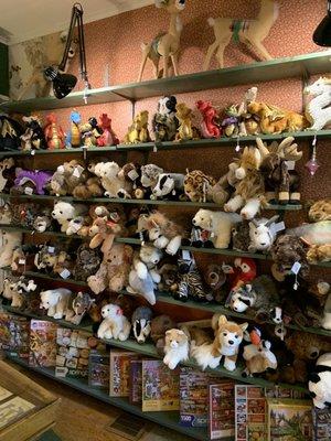 Many stuffed animals and puzzles