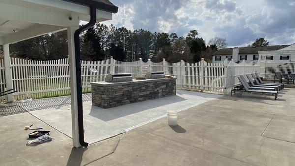 New concrete pad and new stone grills