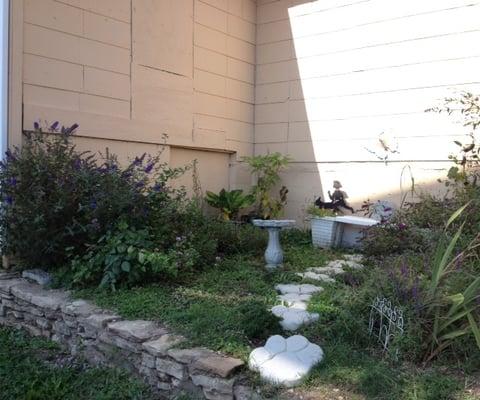 This is a little garden on our property. A place to sit and ponder ( or potty ) :)