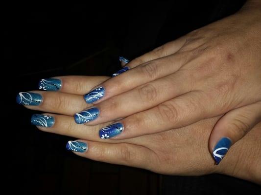 This is a color changing gel polish with designs by Dee