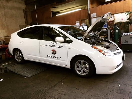 Smog check being performed on a county vehicle.