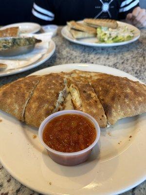 Make your own calzone: margherita pizza toppings with side of marinara (and spinach dip in the background)