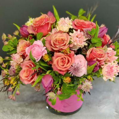 "Cold Brew" roses, "Sweet Flow" garden spray roses with mint, plum tulips and chocolate butterfly ranunculus.