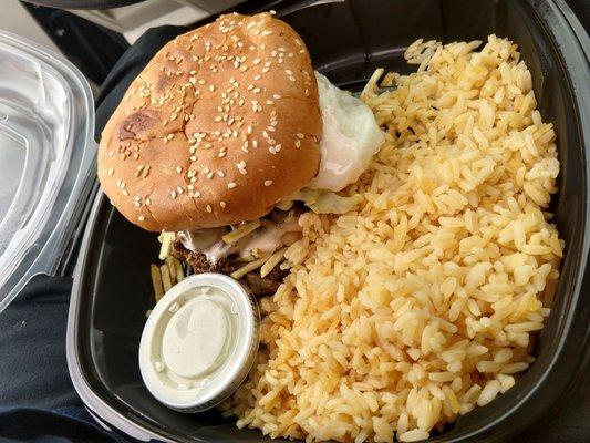 steak sandwich with yellow rice