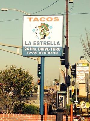 The sign for tacos la Estrella