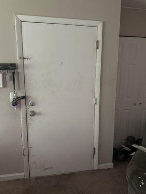 This is how they left the door. Barely works. And that's the front door