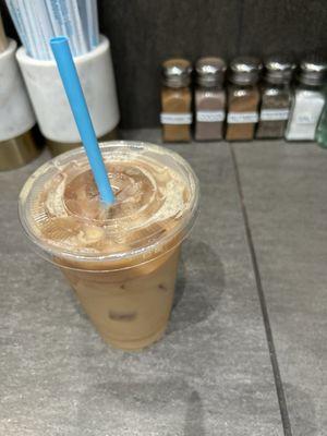 Pistachio cold brew with a splash of milk