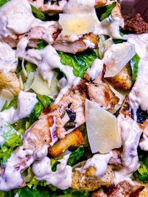 Classic Caesar Salad + herb rubbed grilled chicken - large shavings of Parmigiano-Reggiano pack lots of flavor