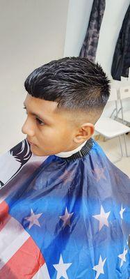 Mohican style for kids with zero fade.