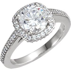 Halo style engagement ring. We can make these with your center stone our ours, in many stone sizes/qualities, and in all precious metals.