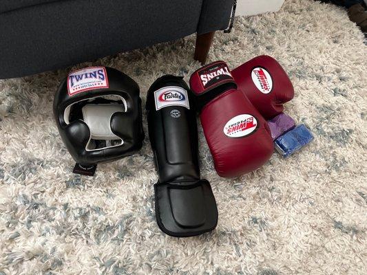 Headgear, shin guards, boxing gloves