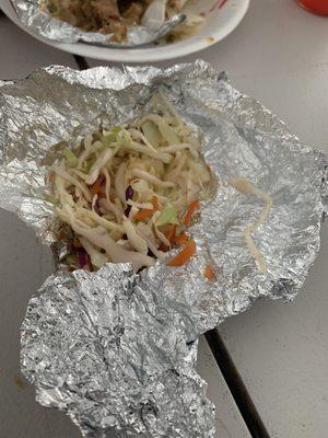 The cabbage topping that comes with an order of a gordita. Stale.