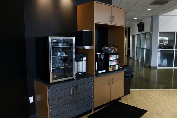 Showroom customer lounge with complimentary water, coffee, tea and snacks.