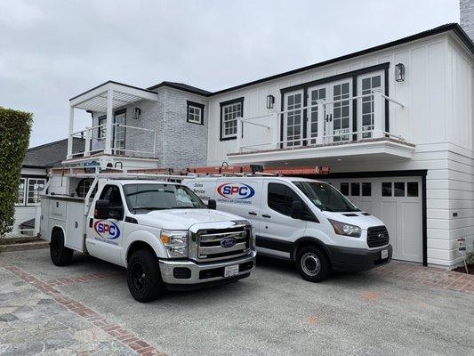 Both trucks doing an AC install in Newport Beach.