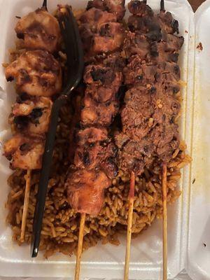 Jollof Rice with Chicken Suya, Shrimp Suya and Beef Suya