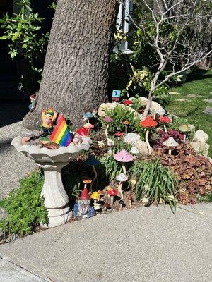 Our pride flag from Mag Pi next to our LGBTQ gnome.