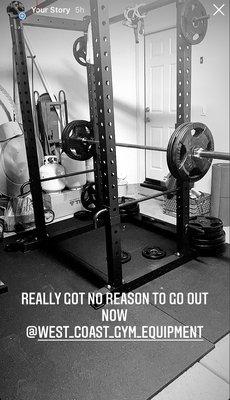 Squat rack, bumper plates, mats, bar.