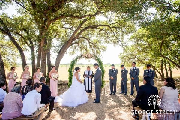 What could be better than a wedding under the towering oaks? Thanks to George Street Photography