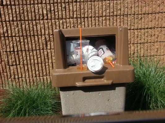 You know there is a lot of repeat biz when the entire drive thru trash can is filed with with their own DD cups.