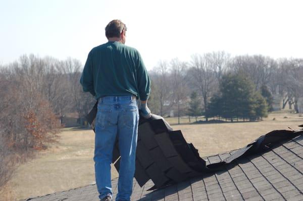 Owner up on the roof.