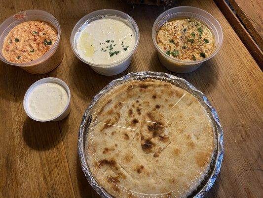 Triple gyro dips with warm pita. Very good! Spicy hummus, tzatziki and then regular hummus