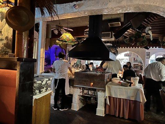 Tortilla maker in the center of the restaurant