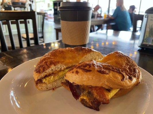 Five cheese bagel, bacon, & cheddar breakfast sandwich.