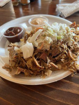 Pulled pork bowl with coleslaw and chopped onion