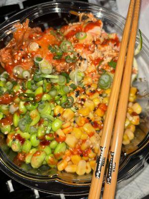 sushi rice & zucchini noodles, with spicy kani, spicy tuna, edamame, corn, sweet chili, sriracha, green onion, & sesame seed