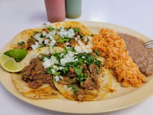 "Carne asada" in front, "al pastor" in back