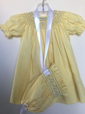 beautiful hand smocked dress by Smockingbirds.