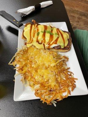 BBQ Brisket Benedict with Hash-browns topped with cheese