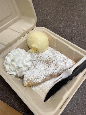 Strawberry, banana Nutella crepe with ice cream/whipped cream and powder sugar