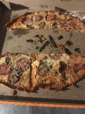 Pepperoni and Mushrooms. No Italian seasoning added the Parmesan Cheese was added it was cold never melted. Only ate the center pieces!