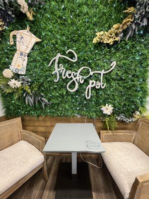 Green wall with seating