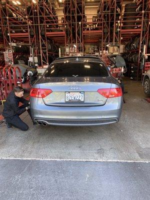 The guys at America's tire doing what they do everyday. Getting me in and out like an Indy pit stop