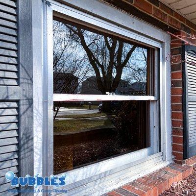 A window after being cleaned by Bubbles