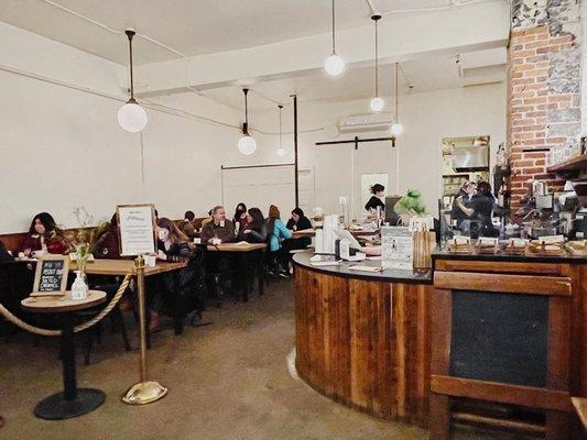 Love the bright interior + exposed brick