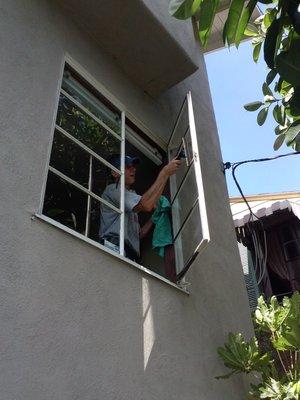 Fred cleaning windows Silverlake home