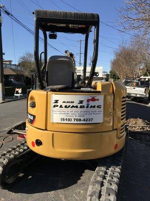 excavator machine used for sewer lateral replacement