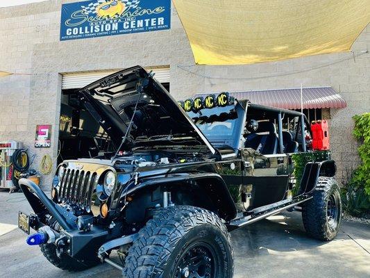 2013 Jeep Rubicon with custom half doors, roof, roll cage, fenders, bumpers, sliders, etc etc etc...