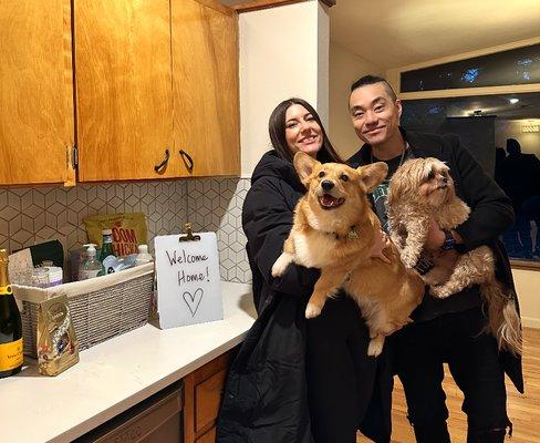 Us with our dogs and the thoughtfully crafted gift basket Erika made for us!