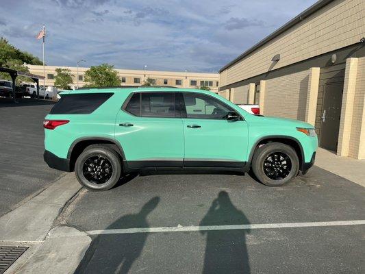 2020 Chevrolet Traverse - Color Change Wrap in Matte Mint, Powder Coated Gloss Black Wheels, Gloss Black Mirrors and Door Handles.