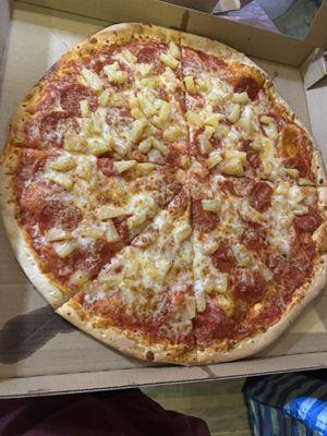 Pineapple and Pepperoni. One slice had no pepperoni on it.