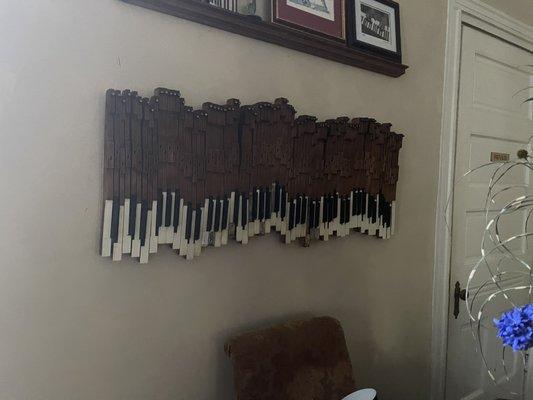 Art work made from owners childhood piano