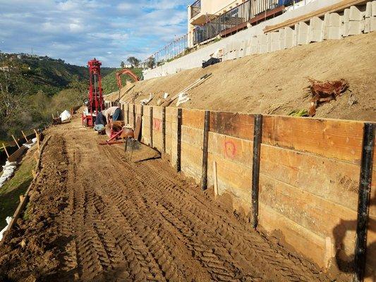 Shoaring up and preparing slope for retaining walls