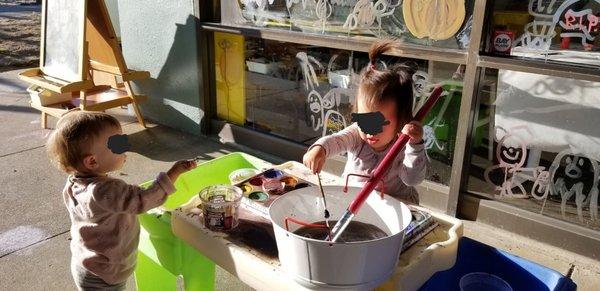 Kids can experience art in the outdoors and get a little messy in a creative way